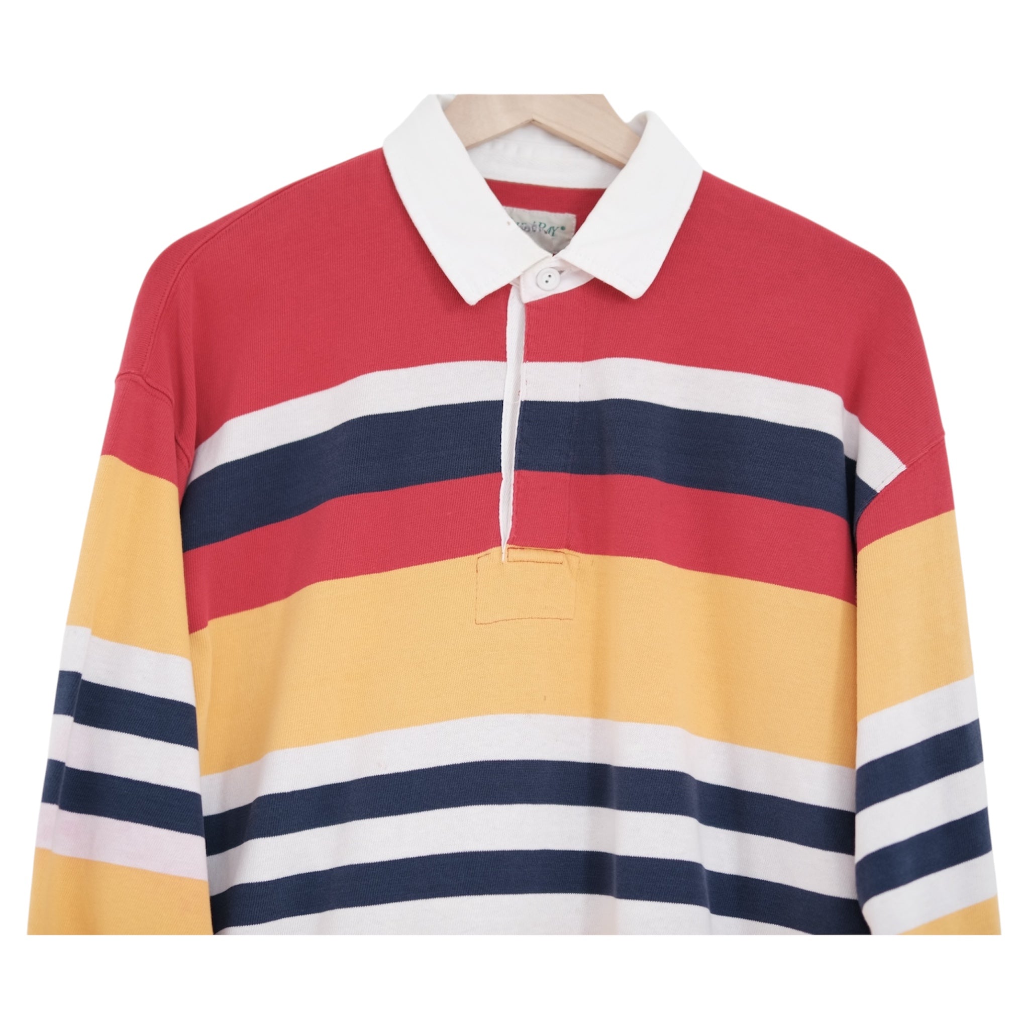 striped rugby in red, butter yellow, midnight navy and shell cream, on a wood hanger
