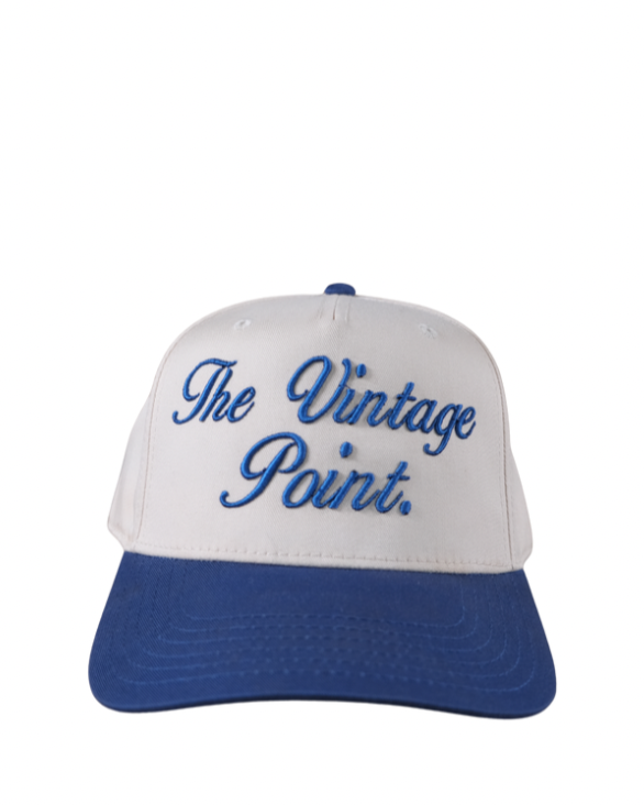 Cream and blue cap with 'The Vintage Point' text on a white background