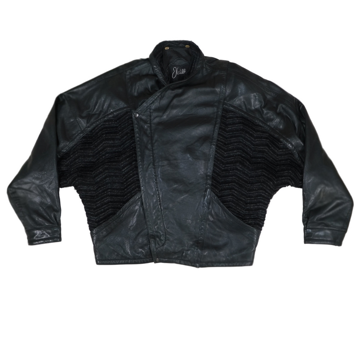 Black leather jacket with a unique pattern on a beige background