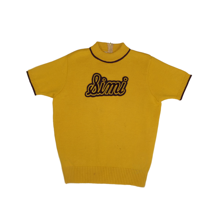 Yellow sweater with 'Simi' branding on a white background